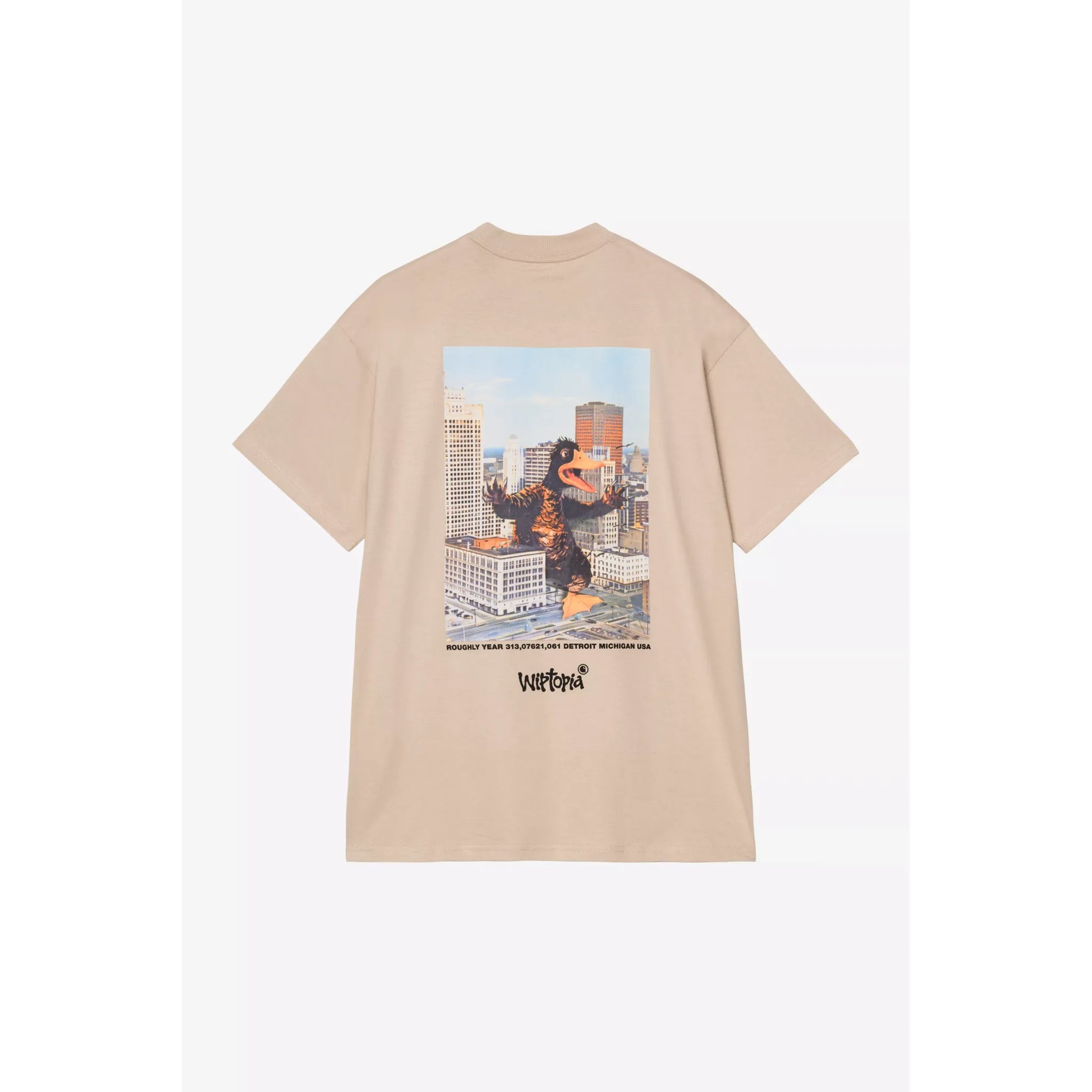 Beige t-shirt with a graphic design of a character holding a building on a white background